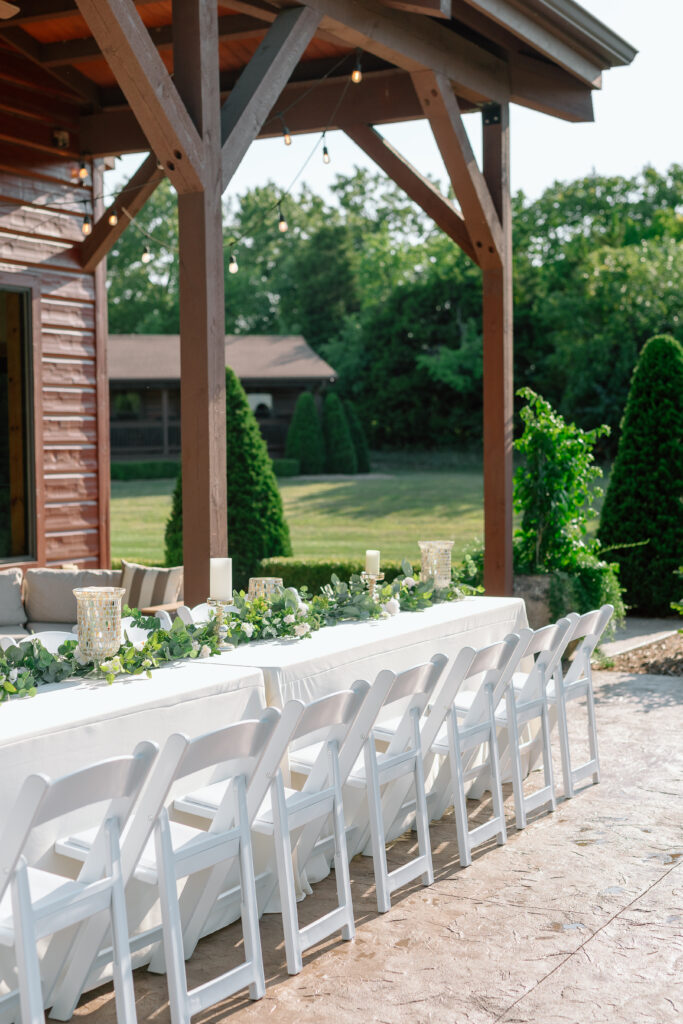 Intimate patio rehearsal dinner table setting